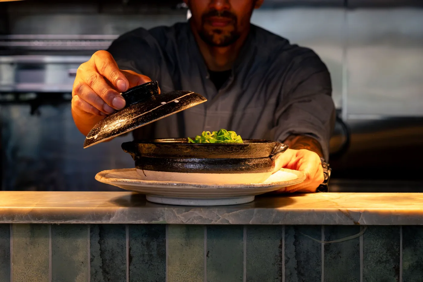Chef finishing a del mar seafood dish at Esquina No. 525, Asbury Park