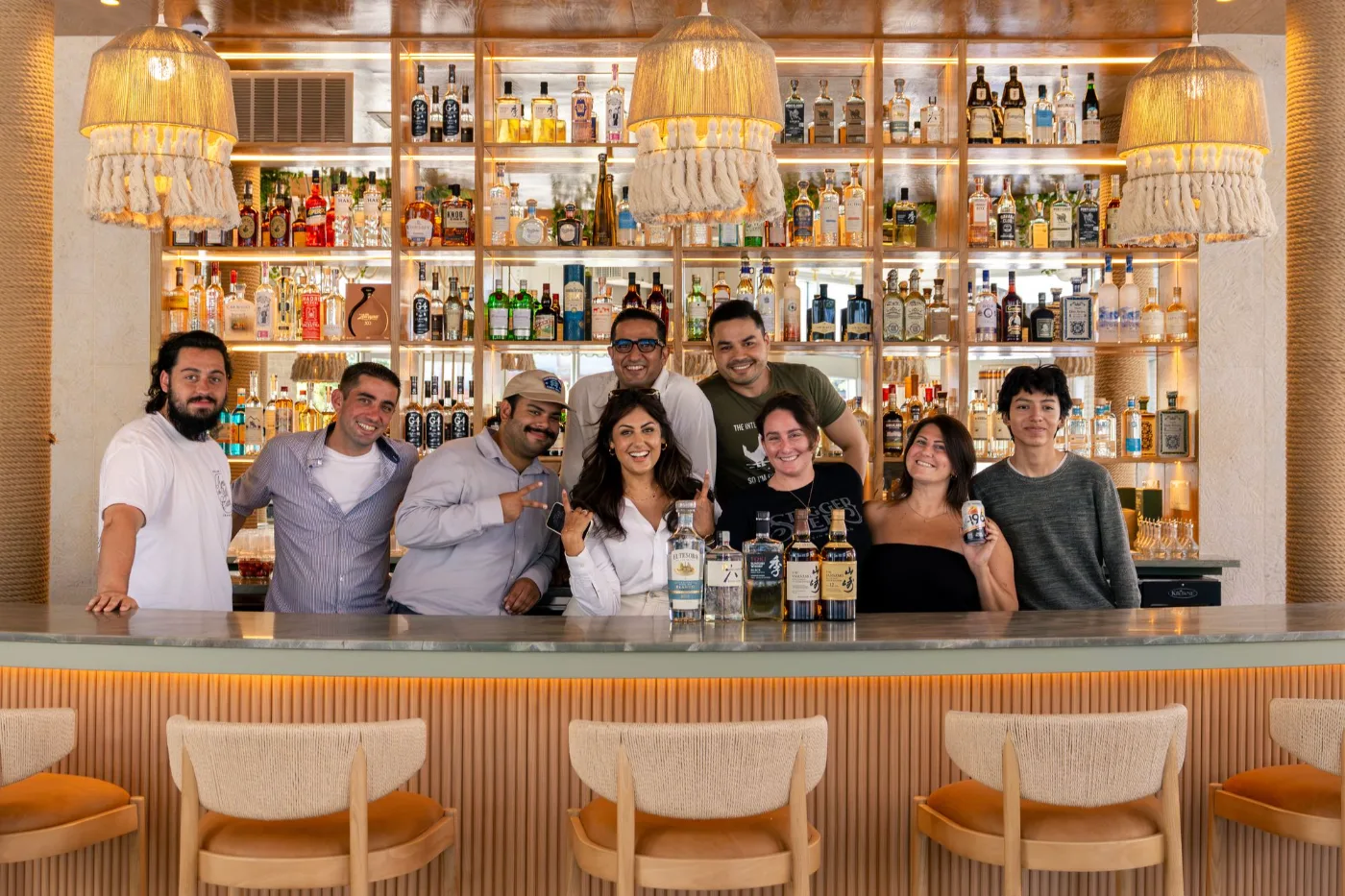 The Esquina No. 525 front- and back-of-house team behind the bar in Asbury Park