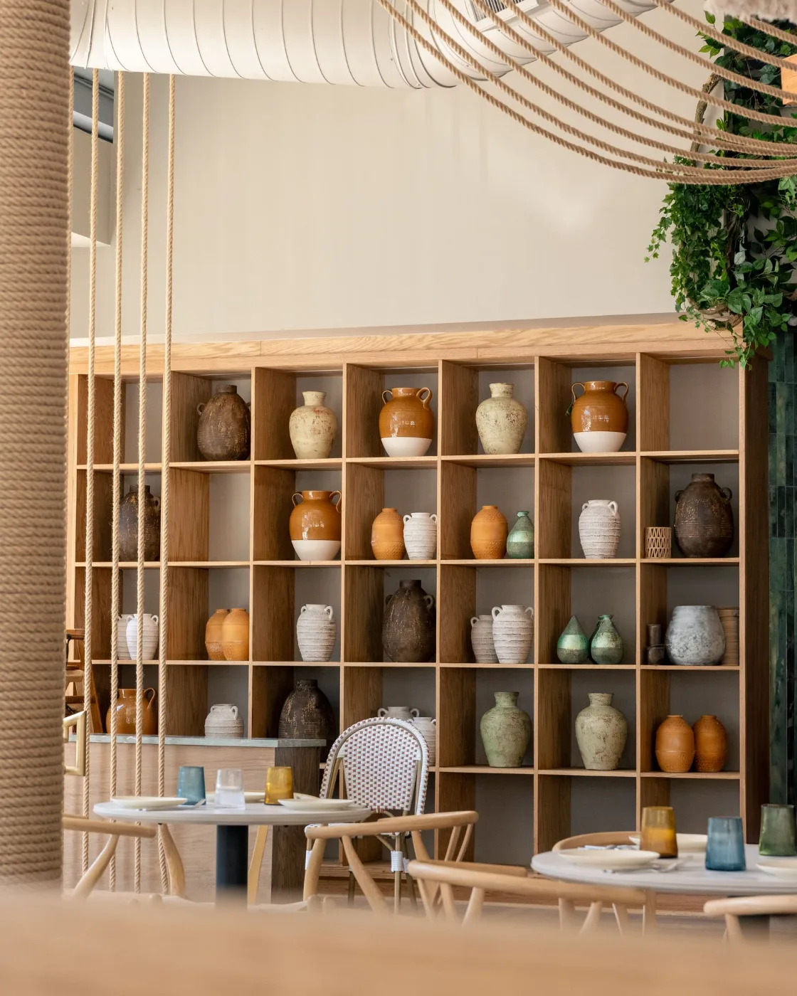 The dining room and ceramic vessel wall at Esquina No. 525, Asbury Park